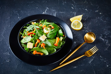 close-up of green fresh salad in a bowl