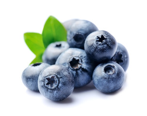 Blueberries with leaves isolated on white backgrounds.