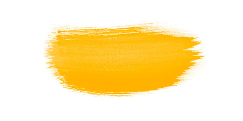 Yellow paint smear brush isolated on white background