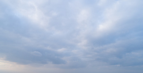 The sky covered by white clouds