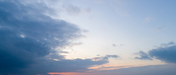 Fototapeta na wymiar Evening blue sky with moderate clouds.