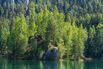 Fototapeta premium Adrspach Teplice rocks, the sandstone landscape in Bohemia, Czech Republic. Cliffs and mountains in Adršpach-Teplice Rocks. Adersbach-Weckelsdorfer Felsenstadt, Europe hills.