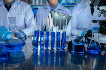 Researcher team and the development of antiretroviral drugs in a chemical laboratory