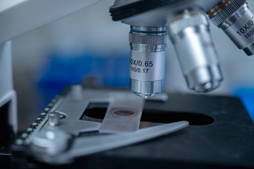 Closeup of Scientific microscope data analysis in the laboratory