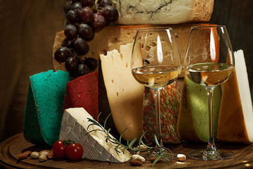 Elite variety of cheese on wooden background