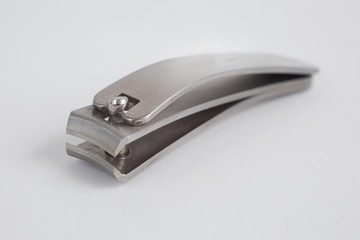 Metal nail clippers on a white background
