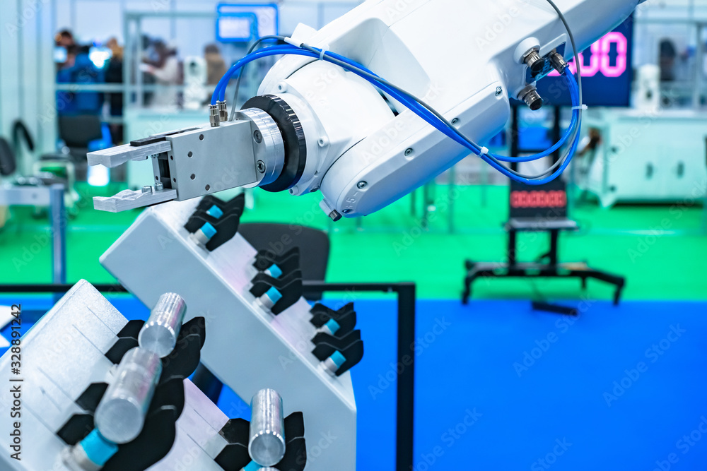 Poster white manipulator arm. robot manipulator in production. concept - the company is developing robots. 