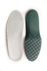 Isolated orthopedic insole on a white background. Treatment and prevention of flat feet and foot diseases. Foot care, comfort for the feet. Wear comfortable shoes.
