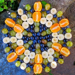 Most beautiful mandala fruits on the plate.