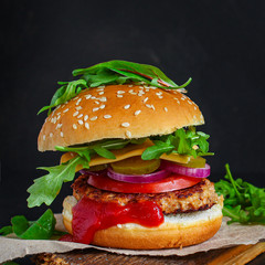 burger, meat cutlet beef steak, tomato, sauce and lettuce tasty meat snack sandwich menu concept. food background. top view. copy space
