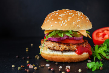burger, meat cutlet beef steak, tomato, sauce and lettuce tasty meat snack sandwich menu concept. food background. top view. copy space