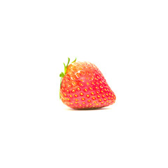 Side view of single  fresh strawberry with leaf isolated on white background.