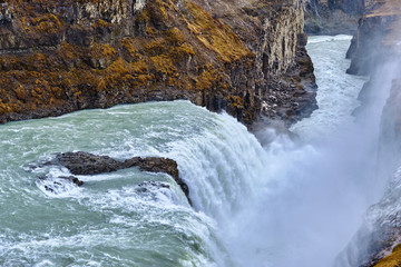The beautiful and fast flowing GullFoss Waterfall on Southern Iceland formed by the Hvita River
