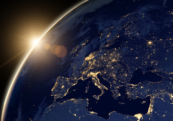 Planet Earth at night, city lights showing human activity in Europe and Middle East from space. Elements of this image furnished by NASA.