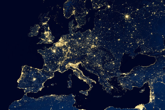 Earth at night, city lights showing human activity in Europe from space. Elements of this image furnished by NASA.