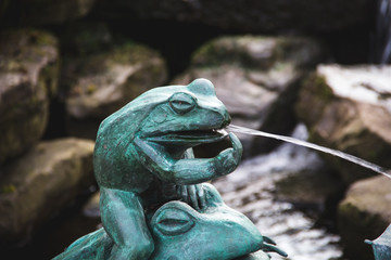 Statue of a Green Frog Cursing with its Middle Finger