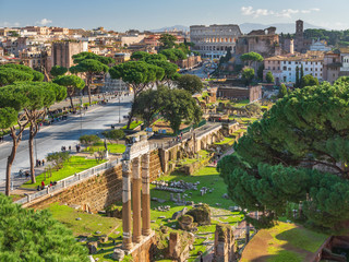 Old arch and view to colosseum in Rome