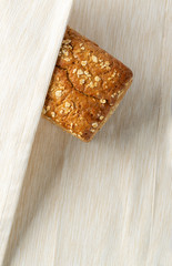 Homemade Traditional Bread on White Fabric Background
