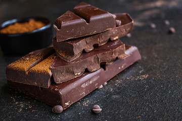 chocolate delicious cocoa dessert, pieces of sweets, menu concept. food background top view. copy...