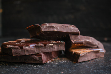 chocolate delicious cocoa dessert, pieces of sweets, menu concept. food background top view. copy space