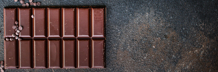 chocolate delicious cocoa dessert, pieces of sweets, menu concept. food background top view. copy space