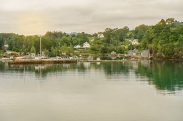 Fototapeta na wymiar Norwegian rural houses sea landscape view, Norway