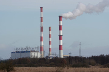 Fototapeta na wymiar power station with chimneyon sky background
