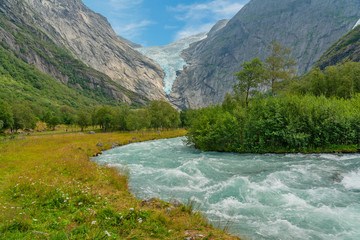 Glacier melting stream, Norway, National park Jostedalsbreen mountain landscape view.