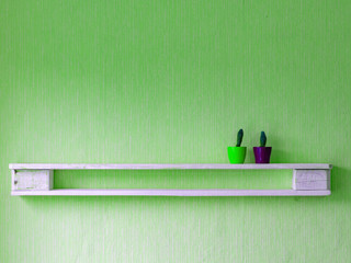 white wooden shelf on the wall