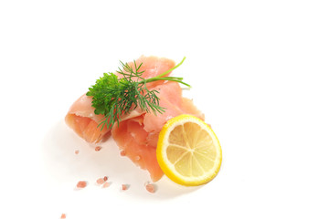 slices of smoked salmon on white background