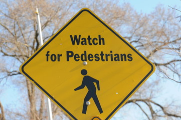 Watch for pedestrians sign