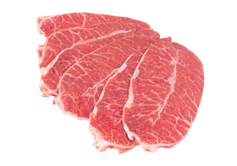 Many raw beef meat slices isolated