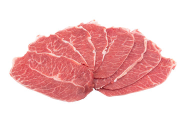 Many raw beef meat slices isolated on white