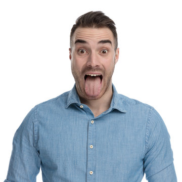 Clumsy Casual Man Sticking Out His Tongue