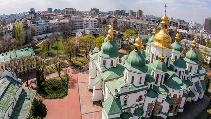 St Sophia's Cathedral in Kiev, Ukraine seen from the bell tower. The cathedral is white with green...