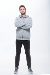 rear view . a young man looks at a large white screen