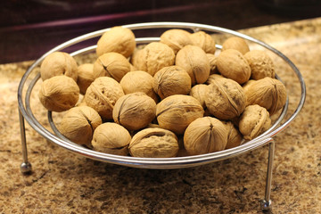 plate with walnuts, background, texture