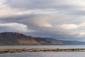 Landscape of westfjord with cloudy sky - Iceland.