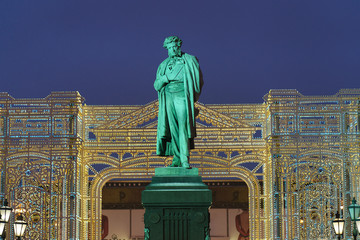 Photography of a bronze statue of russian poet Alexander Sergeyevich Pushkin in Moscow Pushkinskaya...