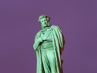 Photography of a bronze statue of russian poet Alexander Sergeyevich Pushkin in Moscow Pushkinskaya...