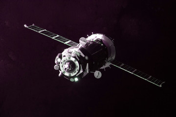Soyuz MS-21 manned spacecraft in orbit around the Earth. Elements of this image furnished by NASA.