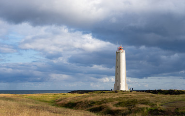 Fototapeta na wymiar celandic Lighthouse Against A sunny Sky. Iceland