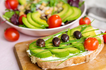 Avocado Salad with Cherry Tomatoes and Baby Spinach and Sandwich .Healthy Food