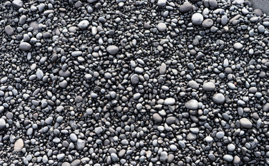 Volcanic rocks on black sand beach, Iceland