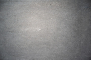 smooth gray concrete background texture with vignette and copy space