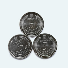 Ukranian money. Five grivna hrivnya new coins isolated on white. Money of Ukraine.