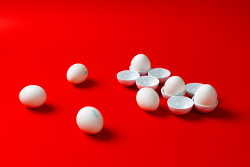 some white chicken eggs flat lay isolated on the colorful background