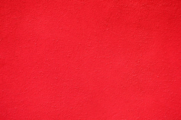 solid background rough texture surface of the wall in red color