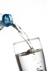 water flowing from bottle to glass	