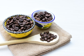 Colombian coffee beans, displayed in containers